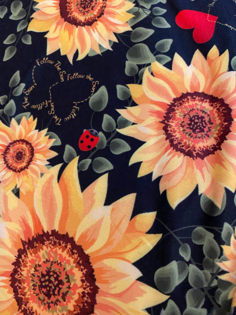 Sunflower Leggings with Black Lace Shorts.