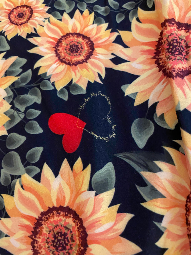 Sunflower Leggings with Black Lace Shorts.